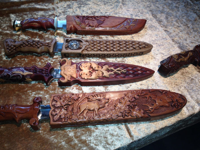 Custom made and carved knife handles and sheaths